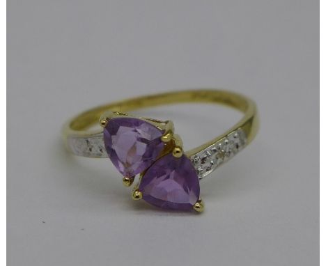 A 9ct gold, diamond and amethyst ring, weight 1.3g, size O