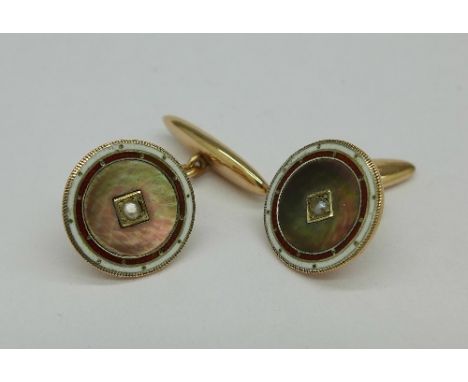 A pair of yellow metal and enamel cufflinks, weight 5.7g
