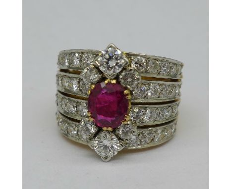 A large diamond and ruby set ring, 1.68 carat ruby weight, approximately 2 carat total diamond weight, weight 19.7g, size Q, 