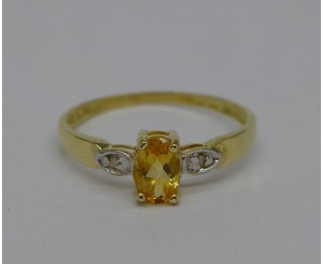 A 9ct gold, citrine and diamond ring, weight 0.9g, size O