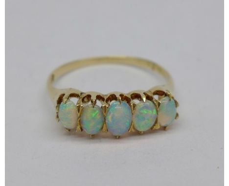 An 18ct gold five stone opal ring, weight 2.9g, size Q