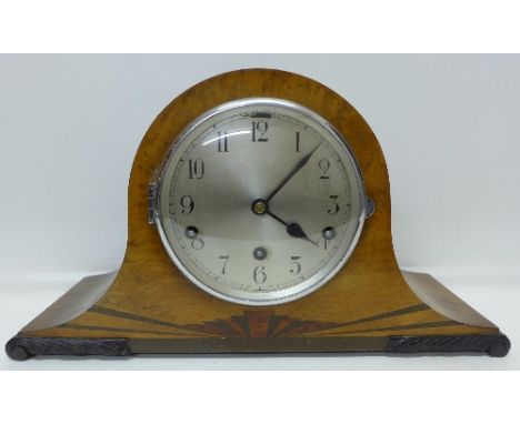 A walnut cased Westminster chiming mantel clock