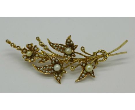 A 14ct gold, seed pearl set floral spray brooch, weight 6.2g