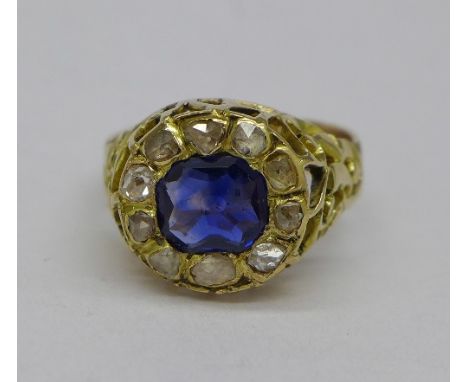 A 19th Century yellow metal sapphire and old cut diamond set ring, 1.25 carat sapphire weight, weight 4.7g, size O