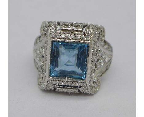 An aquamarine and diamond set, Art Deco style ring, 2.6 carat aquamarine weight, approximately 2.5 carat total diamond weight