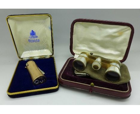 A Ronson lighter and a pair of mother of pearl opera glasses, both cased