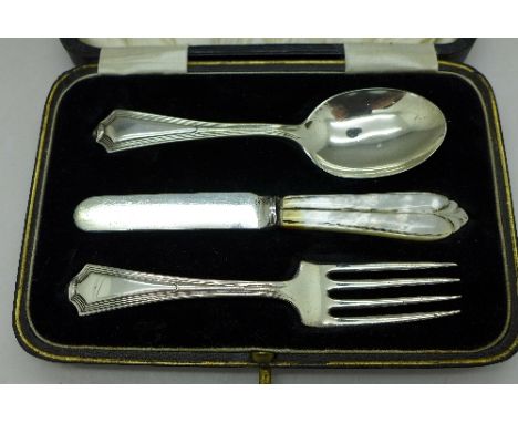 A silver christening set, Birmingham 1923, weight of silver spoon and fork 42g