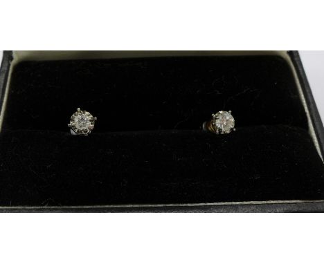 A pair of 10ct gold and diamond stud earrings