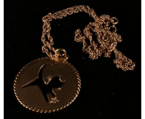 Gold disc pendant with pierced outline of a cat chasing a brilliant cut diamond Cartier ' 14kt 700' CONDITION REPORT: Disc is