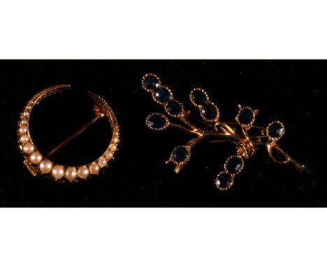 Pearl crescent brooch '15ct' and a spray brooch with sapphires (2) CONDITION REPORT: Pearl brooch:-  All pearls are present a