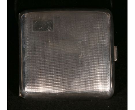 Silver cigarette case of curved shape, engine turned 1965, 3.5oz