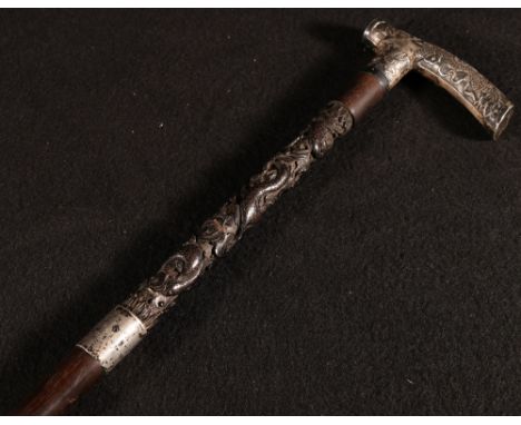 Chinese early 20th century walking cane with silver handle decorated with bamboo and dragon, and silver collar with inscripti