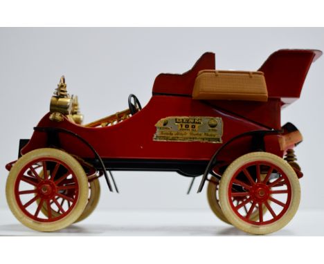 A NOVELTY VINTAGE JIM BEAM 100 MONTHS OLD WHISKEY DECANTER MODELLED AS A CLASSIC CAR - 750ML, 80° PROOF     