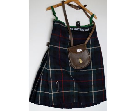 A VINTAGE GENTS KILT WITH A LEATHER SPORRAN     