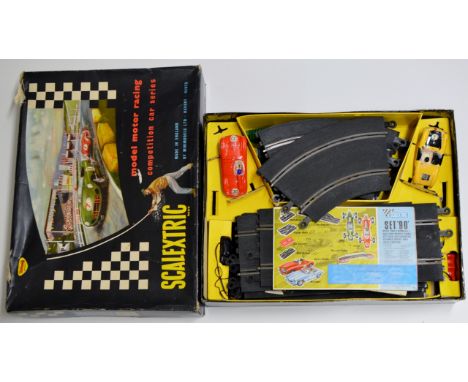 A VINTAGE TRIANG SCALEXTRIC SET WITH ORIGINAL BOX     