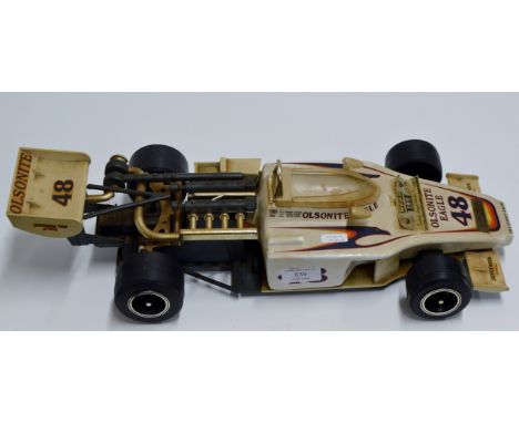 A NOVELTY VINTAGE JIM BEAM 100 MONTHS OLD WHISKEY DECANTER MODELLED AS A RACING CAR - 757ML, 40% VOL     