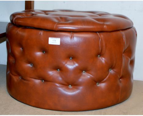 A VINTAGE PADDED LEATHER EFFECT STORAGE FOOT STOOL     