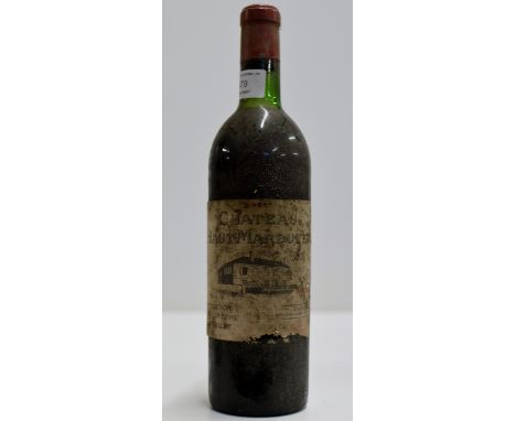 A VINTAGE BOTTLE OF CHATEAU HAUT - MARBUZET 1966 RED WINE     