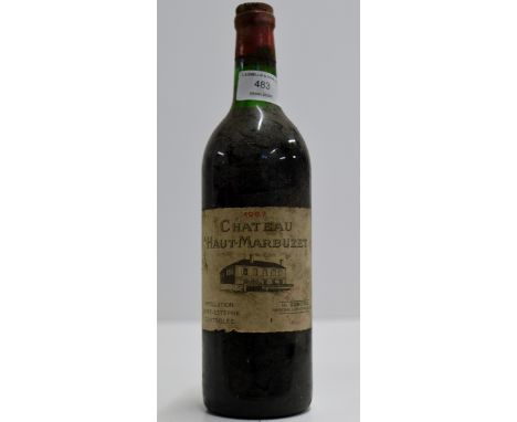 A VINTAGE BOTTLE OF CHATEAU HAUT - MARBUZET 1967 RED WINE