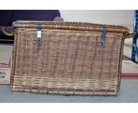 AN OLD WICKER HAMPER     