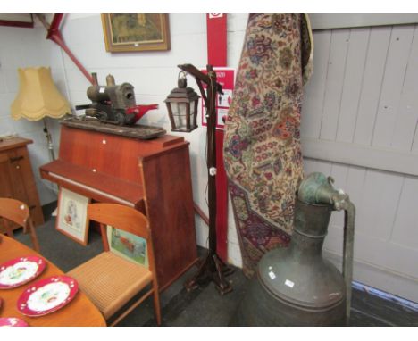 A standard lamp with hanging lantern