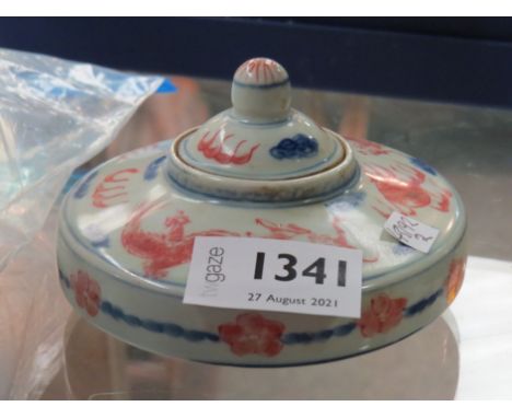 A Chinese Qing Dynasty Kangxi period (1662-1722) porcelain squat form lidded pot with blue and iron-red hand-painted design o