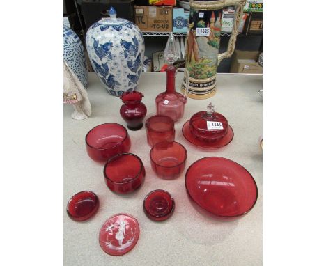 A quantity of cranberry glass including oil bottle, salts, jam pot, Mary Gregory pin dish and a ruby glass vase (13)