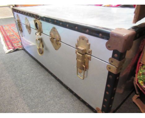 A metallic travelling trunk 