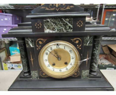 A Victorian marble mantel clock 