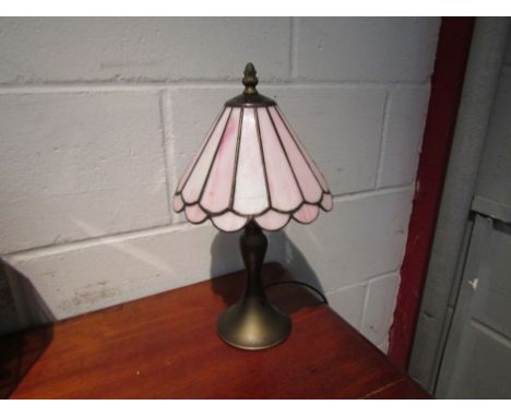 A Tiffany style table lamp with rose pink glass shade, 37cm tall 