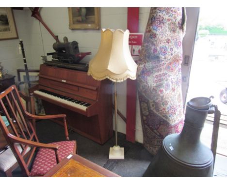 A modern telescopic brass standard lamp with shade 