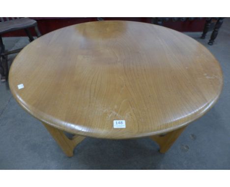 An Ercol circular coffee table