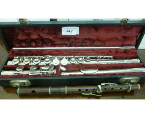 A J R Lafleur & Son flute, in a fitted case; and a smaller rosewood flute        LSB