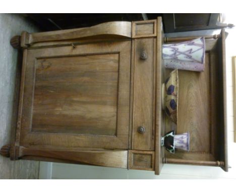 A William IV bleached rosewood chiffonier with carved, bead bordered ornament, the panelled back superstructure featuring a g