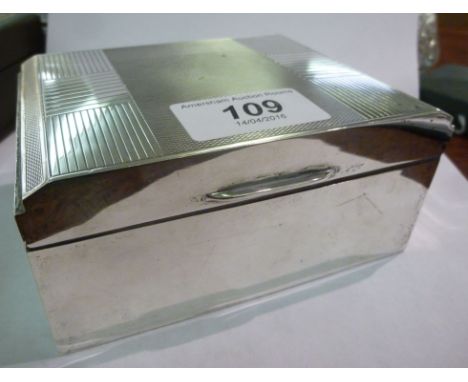 A silver cigarette box, the hinged lid with engine turned decoration  Sheffield 1958  8''w       S