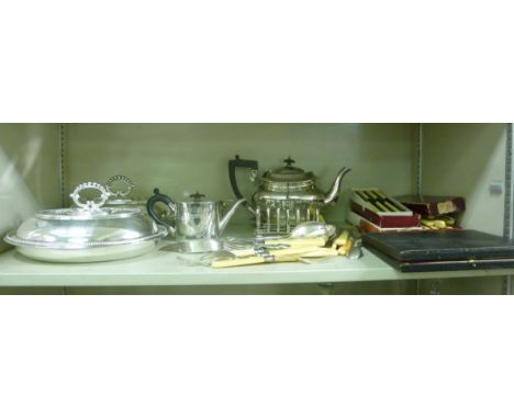 Silver plated tableware: to include a Walker & Hall teapot on stand; and various flatware       OS10