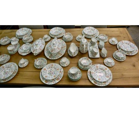 A Minton bone china Haddon Hall pattern dinner service  comprising eight place settings: including tea/coffee set and serving