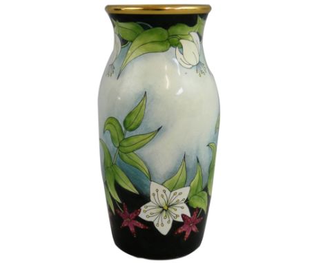 A Moorcroft miniature enamel vase, decorated with flowers and gold trim, c.1999, initialled 'FW' with printed factory marks, 