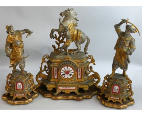 A 19th century French porcelain and spelter clock garniture, c. 1860/70, the central gilt and metal Marley's horse mounted on