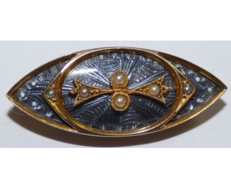 An Edwardian gold, half pearl and enamel brooch, of lozenge shape, the steel blue guioche enamel field with applied decoratio