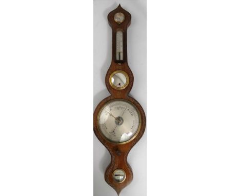 J. Solcha, Hull - a Victorian mahogany wheel barometer, the silvered 8" dial with dry/damp dial, thermometer, convex mirror a