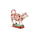 A STAFFORDSHIRE POTTERY COW CREAMER, CIRCA 1830-40