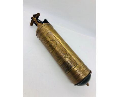 A Vintage Pyrene Fire Extinguisher in brass.