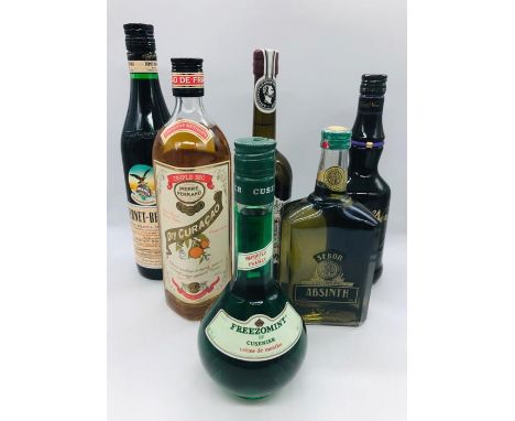 A selection of six bottles to include a Fernet-Branca Diqestif, Crème de Menthe Sebar Absinth, a Pierre Ferrand dry Curacao, 