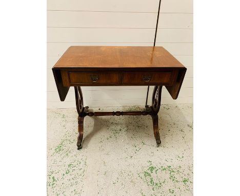 Regency style mahogany sofa table with drop down sides