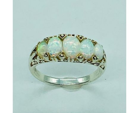 A silver and five stone opal ring