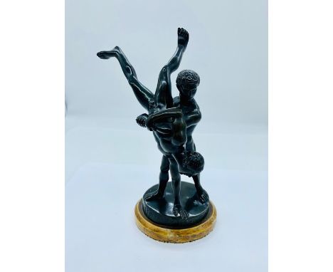 A bronze statue of two men 'Lutteurs' 19cm H 