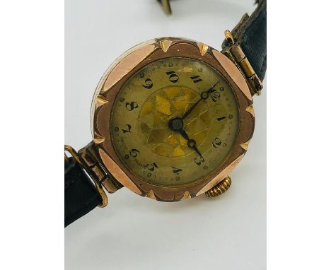 A swiss made gold vintage ladies watch.