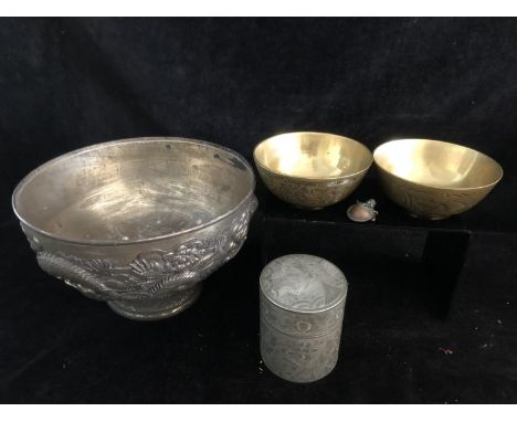 A Japonese antimony footed bowl, decorated with Dragons and chrysanthemums; two brass rice bowls decorated with tigers; and r