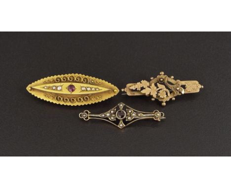 Three antique gold brooches including a 15ct ruby and seed pearl brooch (3) 